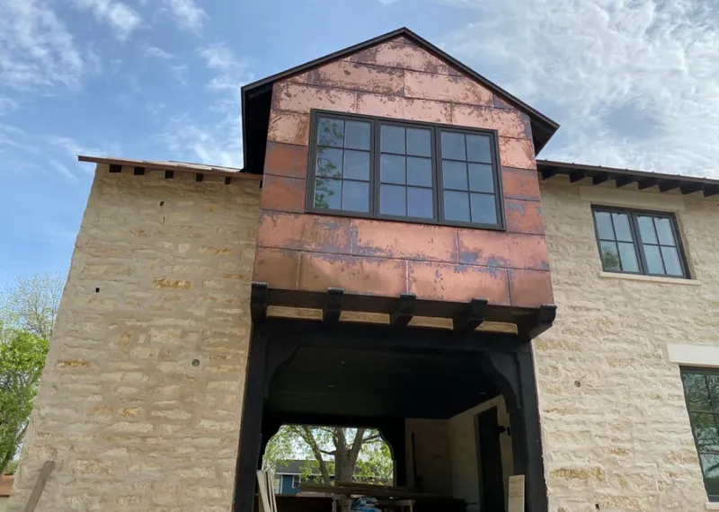 Copper metal panel facade on a stone building for Skylight Installation in Jefferson Hills