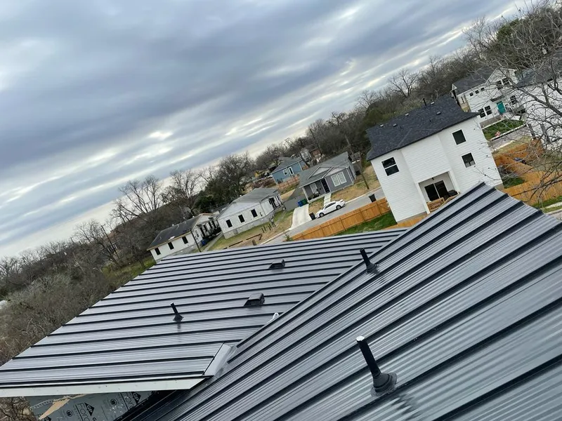 Standing seam metal roof panels with vents for Skylight Repair in Jefferson Hills